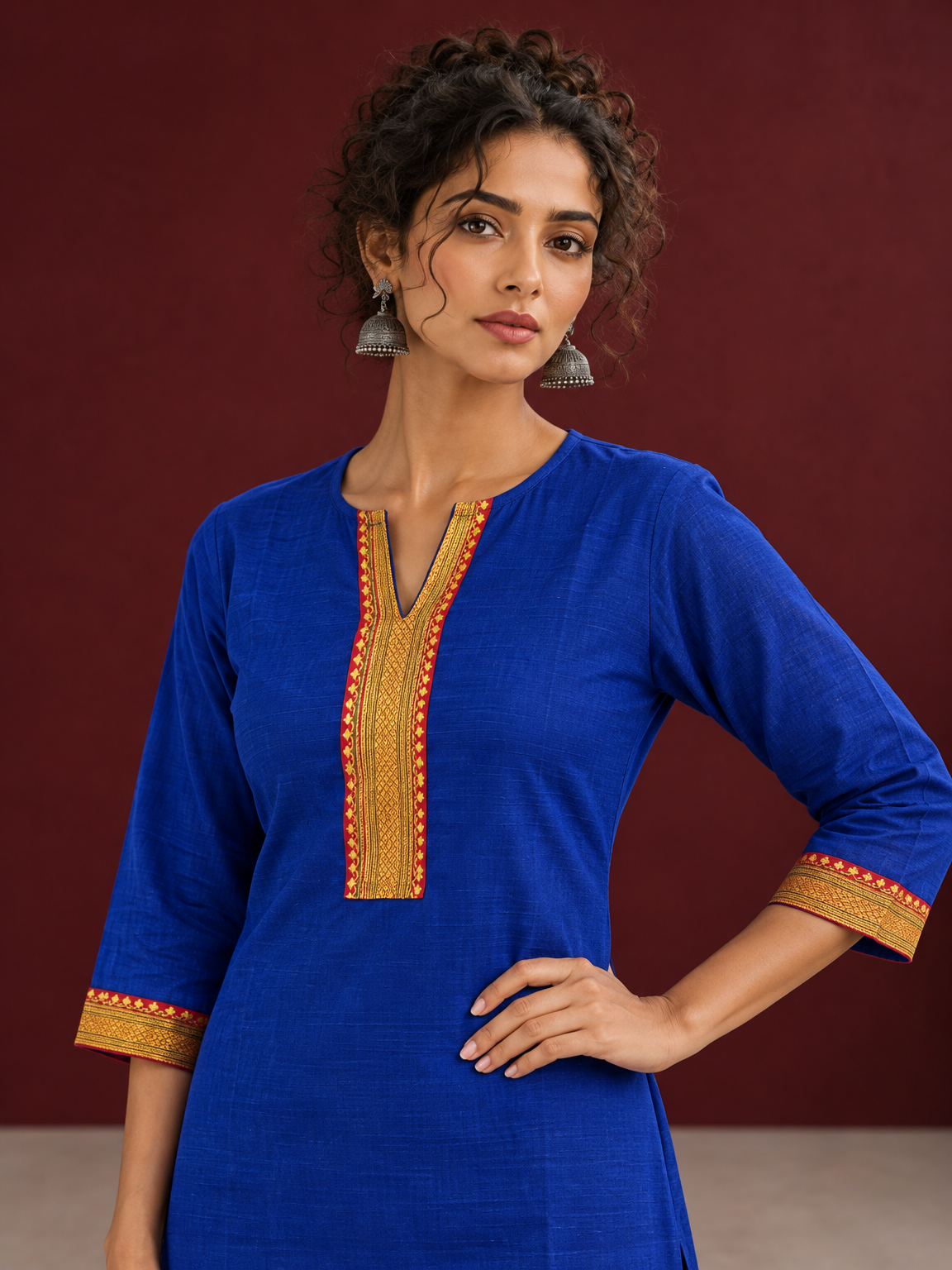 Elegant Royal Blue Cotton Silk Kurta with Contrast Mustard & Red Traditional Border On Neckline and Sleeve Cuff — styled view