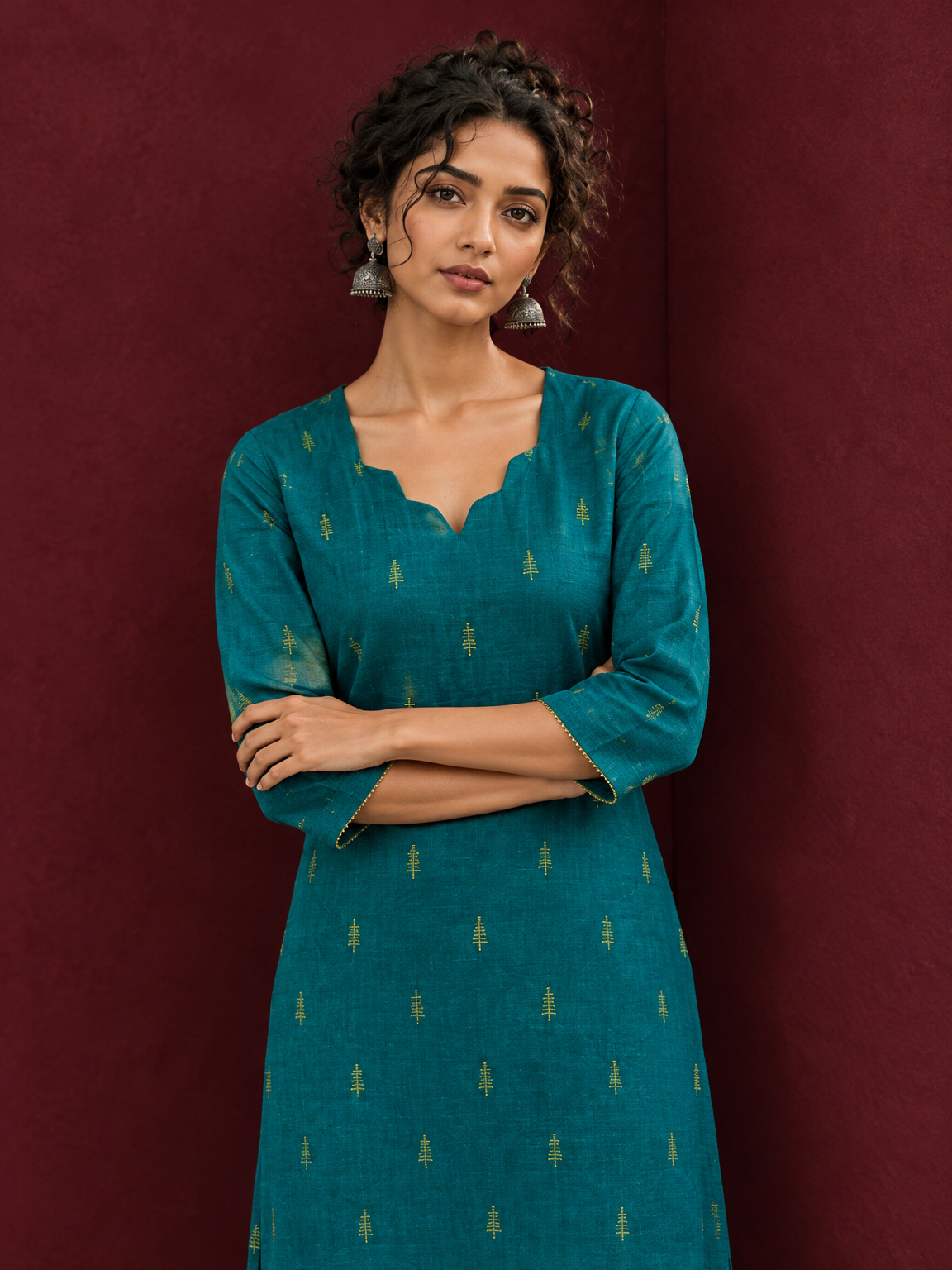 Elegant Teal Cotton Silk Kurta with Golden Motif and Notched Tulip Neckline — styled view