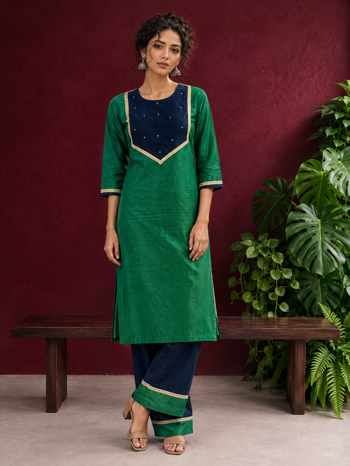Elegant Green Silk Kurta with Contrast Navy Blue Yoke Panel, Sequin Embellishment & Gota Trim — front view