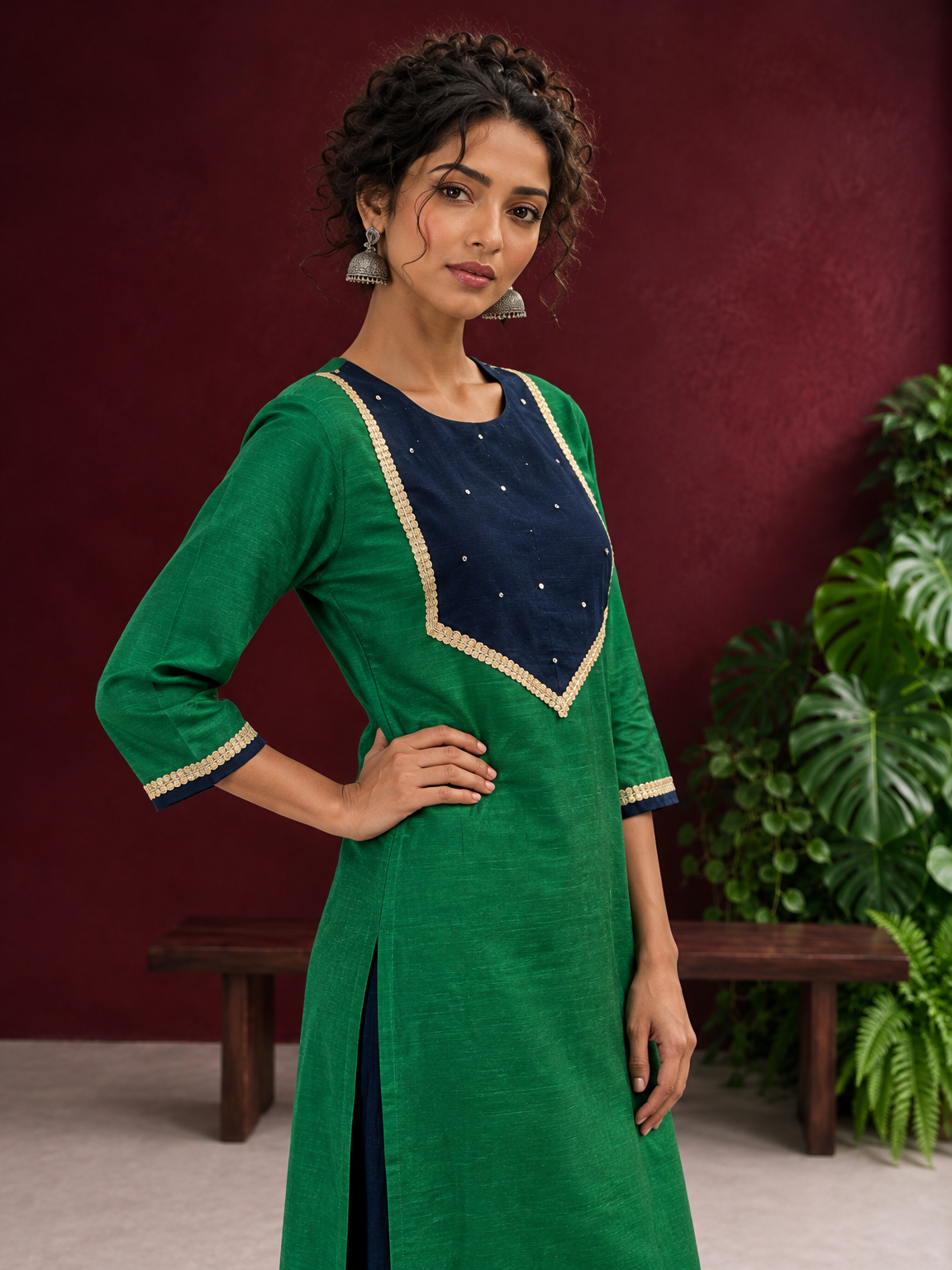 Elegant Green Silk Kurta with Contrast Navy Blue Yoke Panel, Sequin Embellishment & Gota Trim — fabric detail