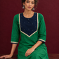 Elegant Green Silk Kurta with Contrast Navy Blue Yoke Panel, Sequin Embellishment & Gota Trim — seated detail