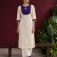 Elegant Off-White Silk Kurta with Contrast Purple Yoke Panel & Hand Embroidered Sequin Detailing — front view