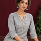 Elegant Grey Cotton Silk Kurta with Gold Gota Lace Trim V-Neck — seated detail