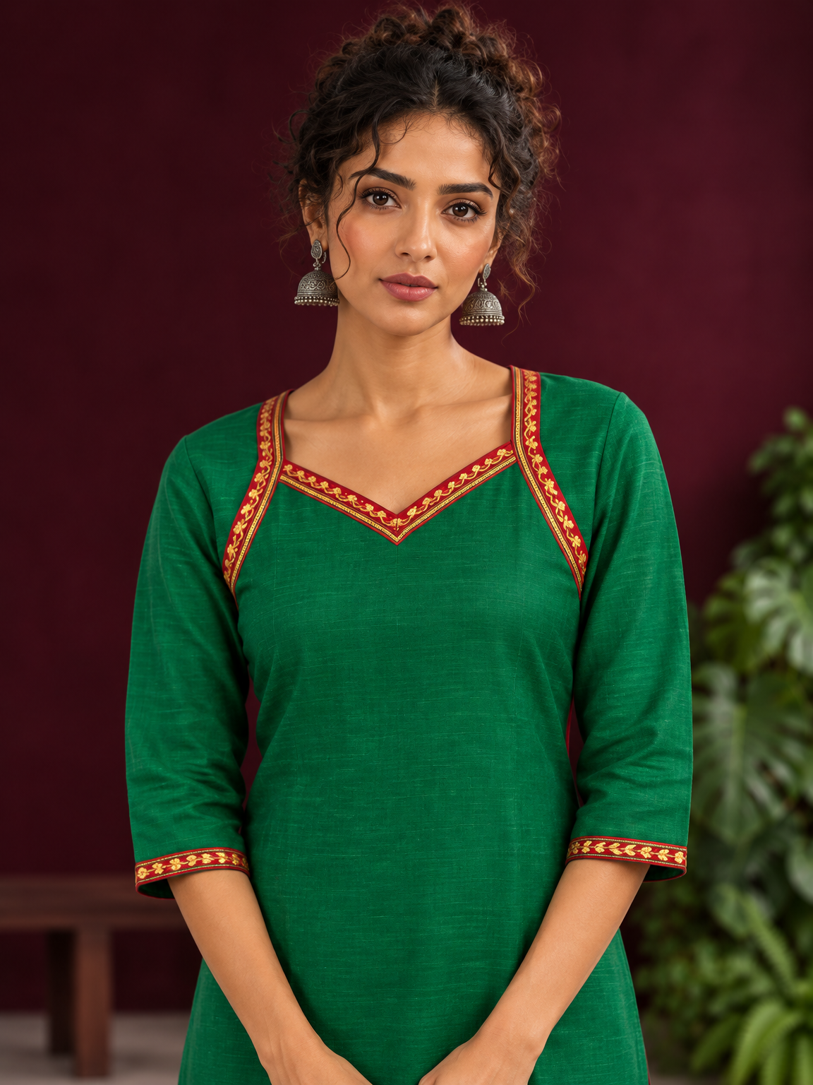 Vibrant Green Silk Kurta with Contrast Maroon Traditional Lace On Neckline — fabric detail