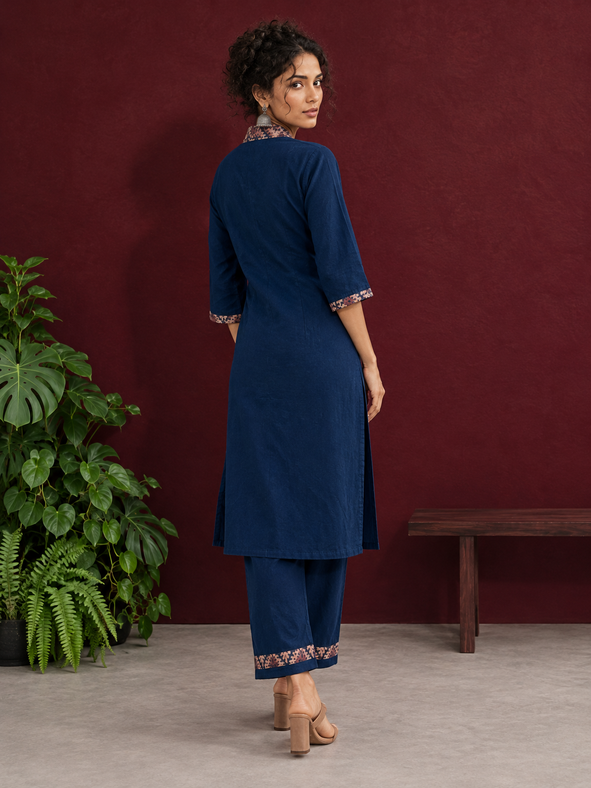 Elegant Teal Blue Rayon kurta with Contrast Kalamkari Printed Collar and Cuffs — back view