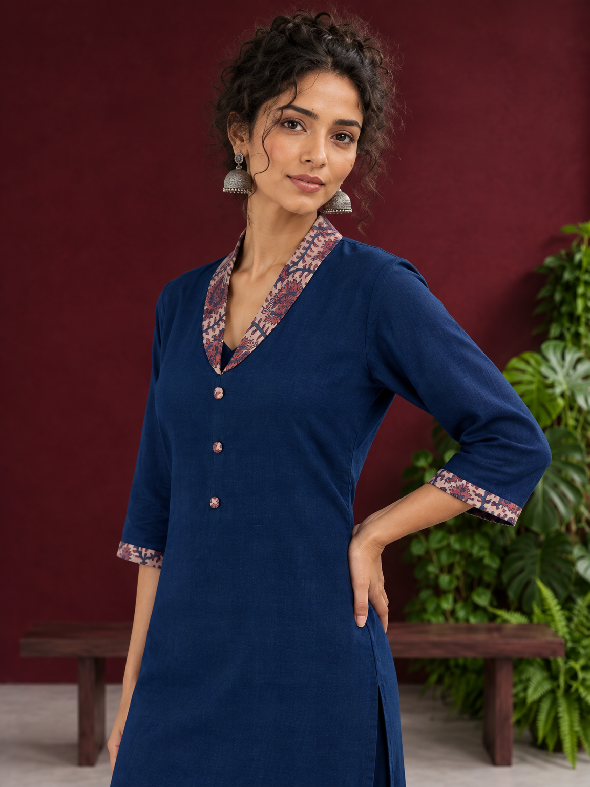 Elegant Teal Blue Rayon kurta with Contrast Kalamkari Printed Collar and Cuffs — styled view