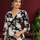 Classic Black Rayon Kurta with White Floral Print and Contrast Notched Neckline — fabric detail