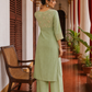 Elegant pista Green Kurta with Golden Floral brocade Yoke, appliqué Sleeve hem