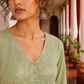 Elegant pista Green Kurta with Golden Floral brocade Yoke, appliqué Sleeve hem