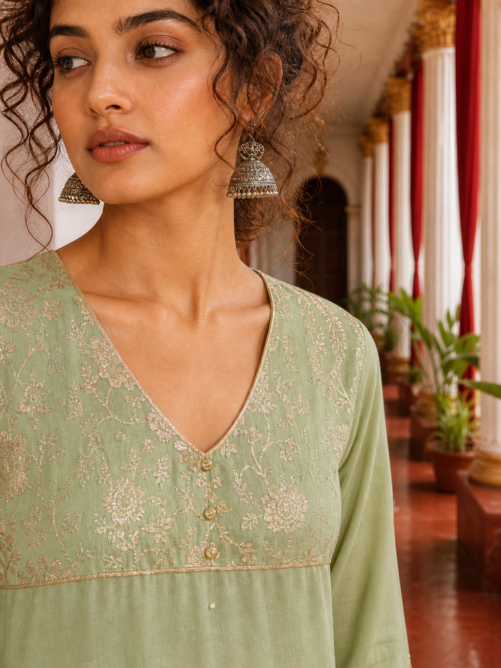 Elegant pista Green Kurta with Golden Floral brocade Yoke, appliqué Sleeve hem