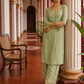 Elegant pista Green Kurta with Golden Floral brocade Yoke, appliqué Sleeve hem