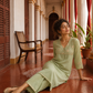 Elegant pista Green Kurta with Golden Floral brocade Yoke, appliqué Sleeve hem