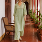 Elegant pista Green Kurta with Golden Floral brocade Yoke, appliqué Sleeve hem