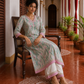 Elegant Off-White Floral Printed Kurta with Pink hand embroidered V-Neck patch