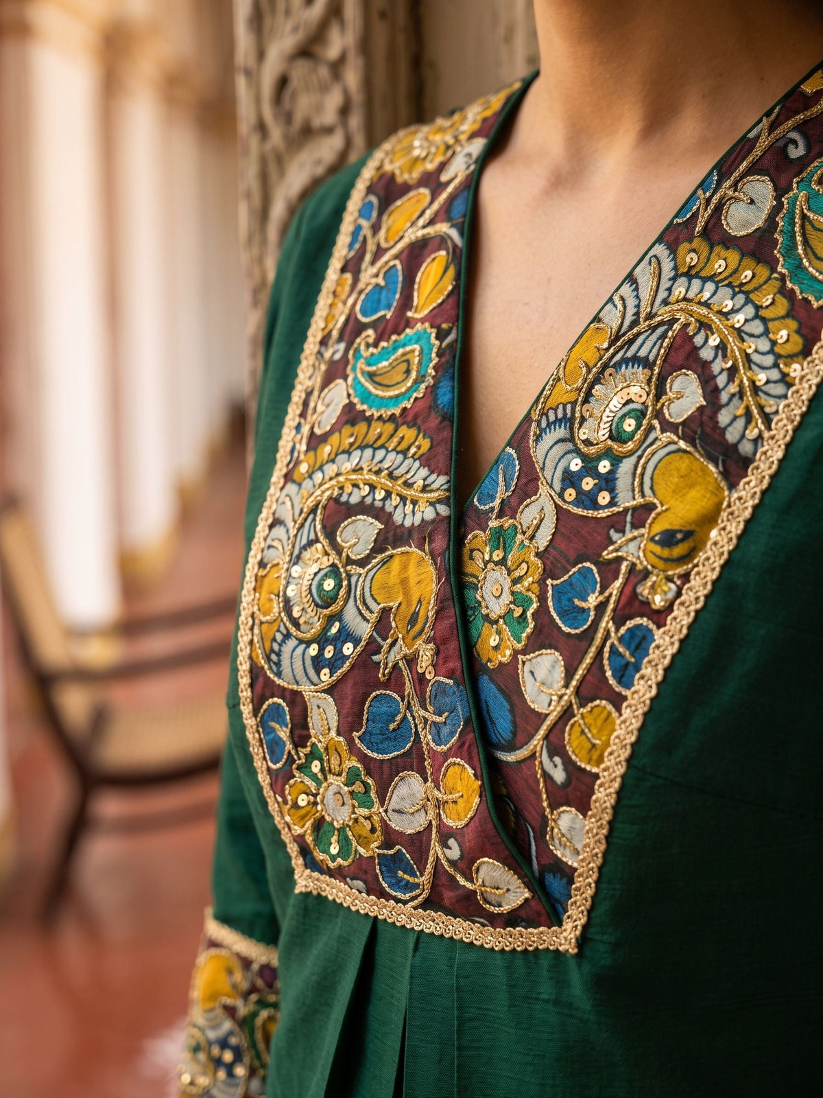 Elegant Bottle Green Dress with Kalamkari Print Yoke, Contrast Sleeve Cuffs