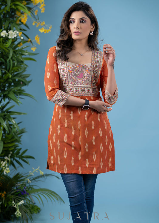 Graceful orange cotton ikat tunic with madhubani combination