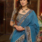 Exclusive Teal blue cotton saree highlighted with kalamkari and indigo borders