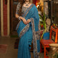 Exclusive Teal blue cotton saree highlighted with kalamkari and indigo borders