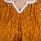 Stylish Mustard Rayon gathered top in bandhani print