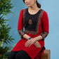 Classic red cotton tunic with ajrakh combination yoke highlighted with applique motif