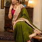 Elegant moss green cotton saree highlighted with handpainted madhubani