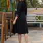 Black cotton dress with hand embroidered mirror work on sides