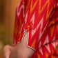 Elegant orange ikat kurta with patchwork buttons & palazzo Stole optional