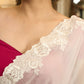 Graceful ivory organza saree with elegant floral embroidery on the border