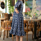 Trendy navy blue floral printed rayon gathered dress highlighted with beautiful lace