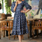 Trendy navy blue floral printed rayon gathered dress highlighted with beautiful lace
