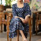 Trendy navy blue floral printed rayon gathered dress highlighted with beautiful lace