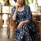 Trendy navy blue floral printed rayon gathered dress highlighted with beautiful lace