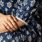 Trendy navy blue floral printed rayon gathered dress highlighted with beautiful lace