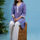Graceful lilac cotton tunic highlighted with beautiful crochet laces