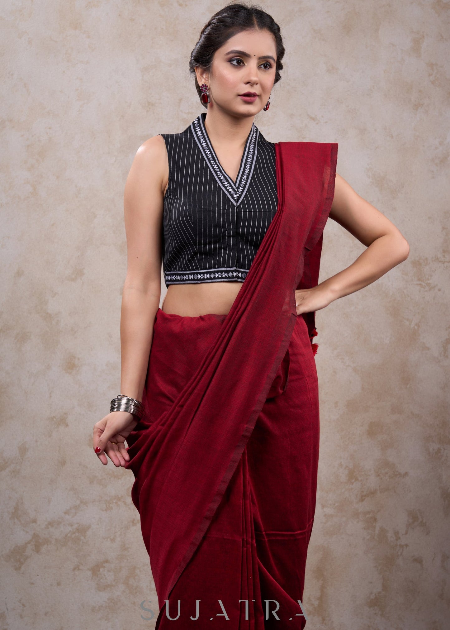 Trendy black striped cotton highneck blouse highighted with ikat border