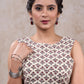 Classy white printed cotton sleeveless blouse