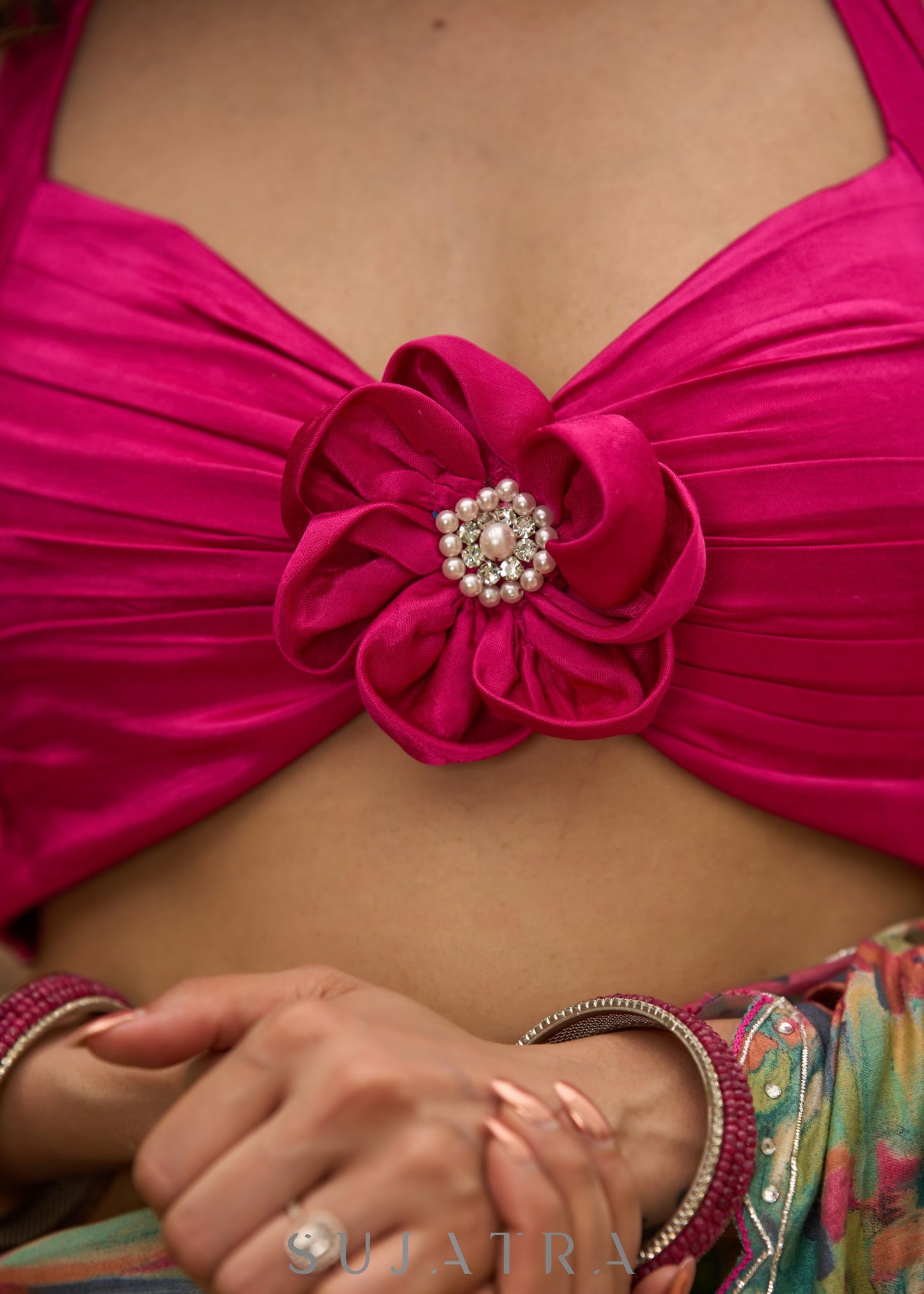 Graceful Hot pink satin halter neck blouse with attached floral brouche