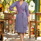 Elegant lilac cotton overlap dress highlighted with contrast embroidery