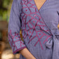 Elegant lilac cotton overlap dress highlighted with contrast embroidery