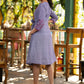 Elegant lilac cotton overlap dress highlighted with contrast embroidery