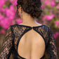 Trendy black net full sleeve blouse highlighted with red stones