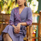 Elegant lilac cotton overlap dress highlighted with contrast embroidery