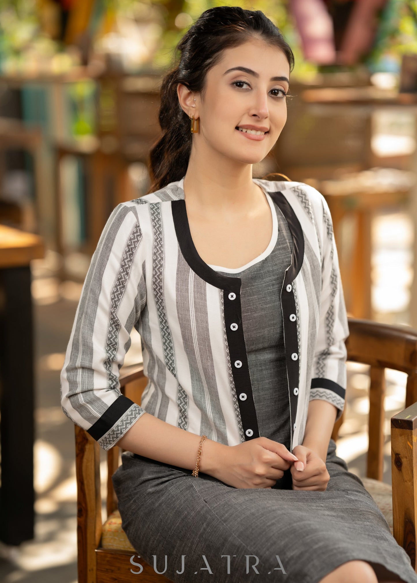Elegant grey dress with striped ikat jacket