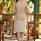 Beige blazer with striped dress