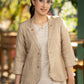 Beige blazer with striped dress