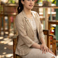 Beige blazer with striped dress