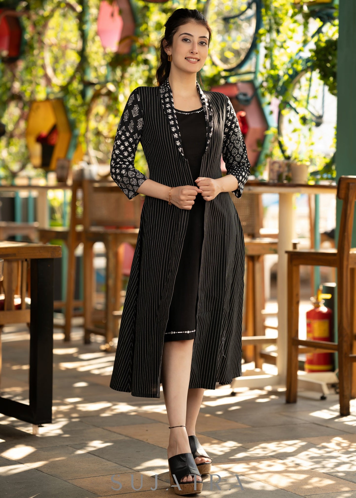 Black dress with striped front open jacket