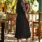 Black dress with striped front open jacket