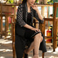 Black dress with striped front open jacket