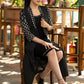 Black dress with striped front open jacket